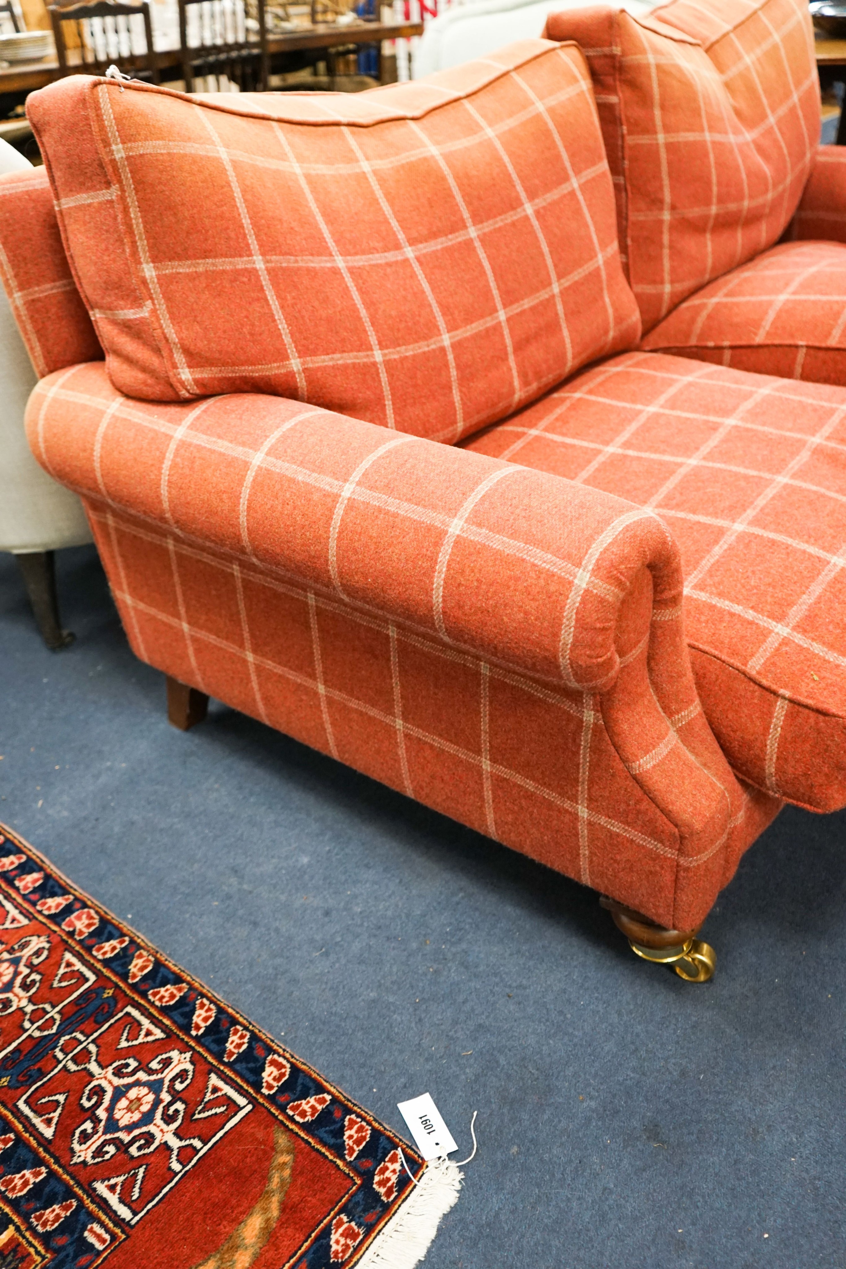 A contemporary patterned red fabric two seater settee, length 180cm, depth 100cm, height 92cm